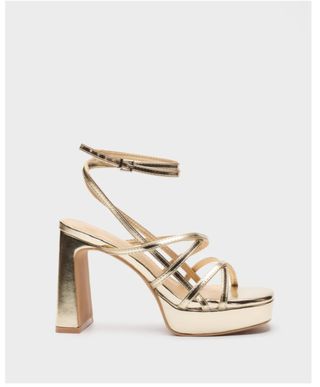 Zapatos de fiesta dorados sin usar
