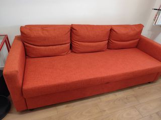 Divano letto angolare arancione con contenitore