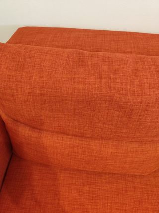 Divano letto angolare arancione con contenitore