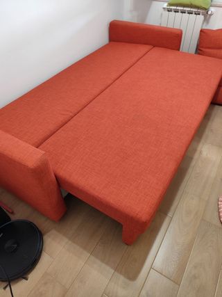 Divano letto angolare arancione con contenitore