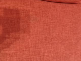 Divano letto angolare arancione con contenitore