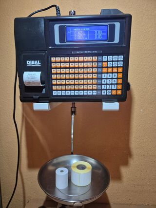 Balanza DIBAL con ticket y etiquetas GARANTIA 