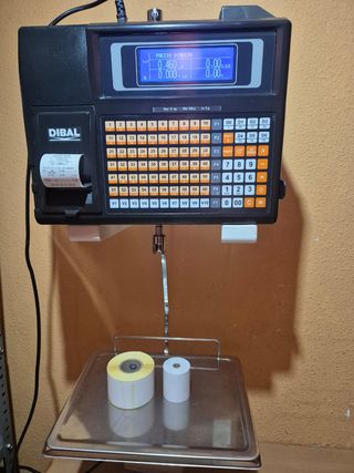 Balanza DIBAL con ticket y etiquetas GARANTIA 