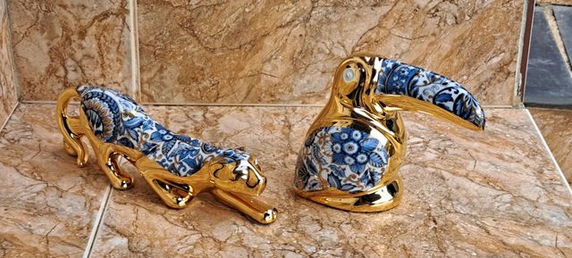 Figure in porcellana dorata stile Artur.