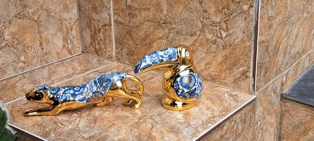 Figure in porcellana dorata stile Artur.