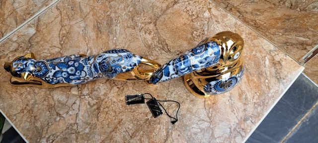 Figure in porcellana dorata stile Artur.