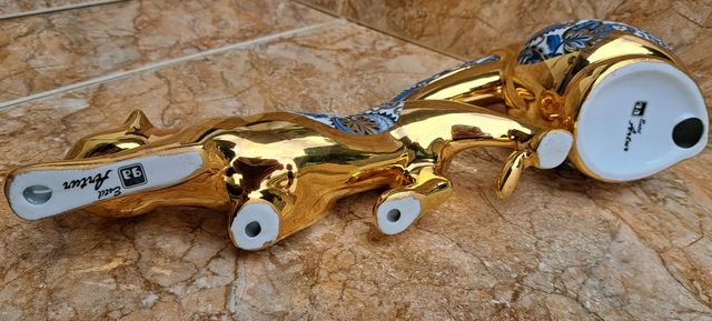 Figure in porcellana dorata stile Artur.