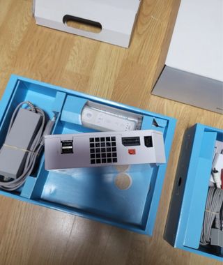 Console Nintendo Wii + Pacchetto Mario Kart Wii