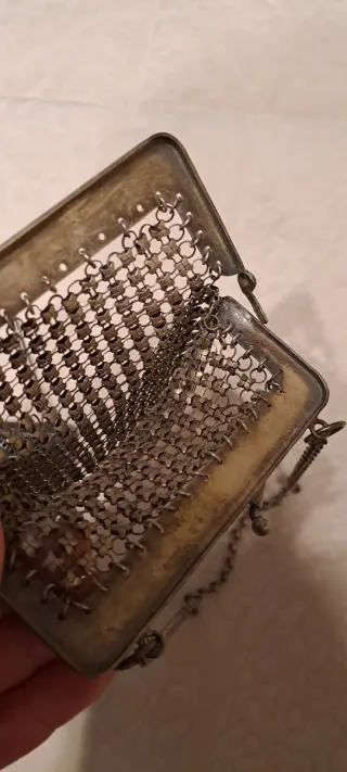 Bolso monedero plateado