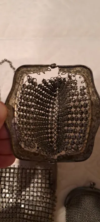 Bolso monedero plateado