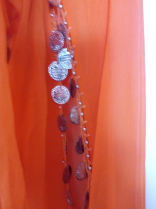 Conjunto naranja con monedas ajustablealcuerpo 44