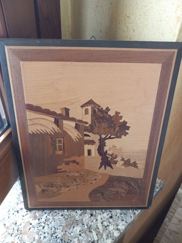 Quadro intagliato a mano in legno