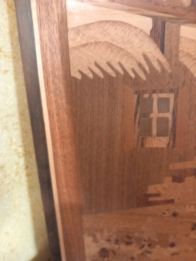 Quadro intagliato a mano in legno