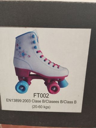 Patines de 4 ruedas blancos y rosas