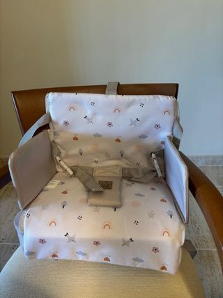 Trona de viaje con almacenaje