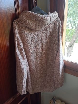 Jersey de punto rosa con cuello alto