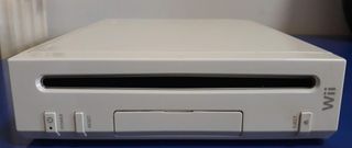 Nintendo Wii + Microfono Konami + 4 Giochi