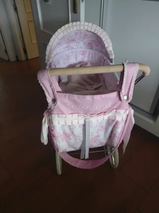 Carrito de muñecas rosa