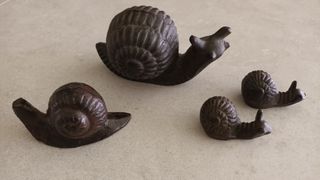 4 Figuras de Caracol de Hierro