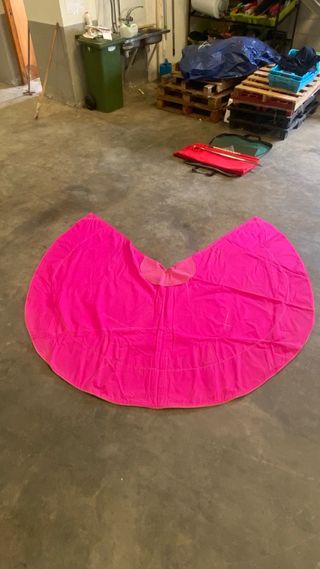 Capote de torear rosa