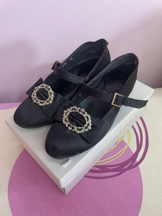 Zapatos de niña negros con hebilla