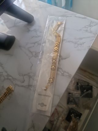 Conjunto bisutería pulsera y cadena dorada hombre