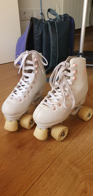Patines blancos talla 36-37 + mochila con carro