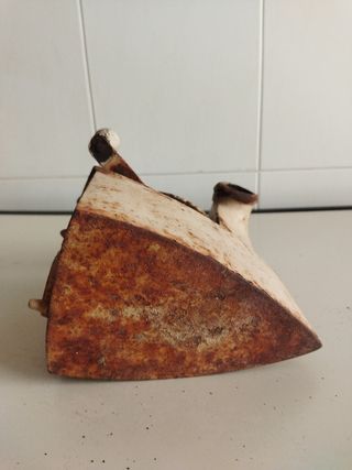 Plancha antigua de carbón