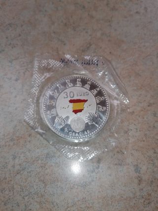 Moneda plata Covid