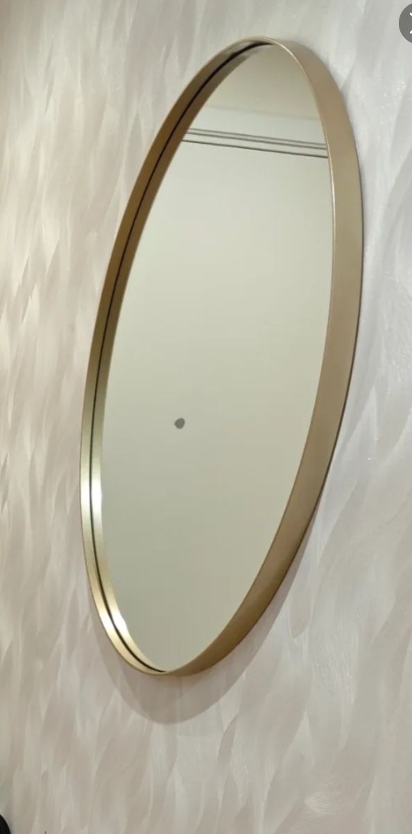 Specchio da parete ovale dorato