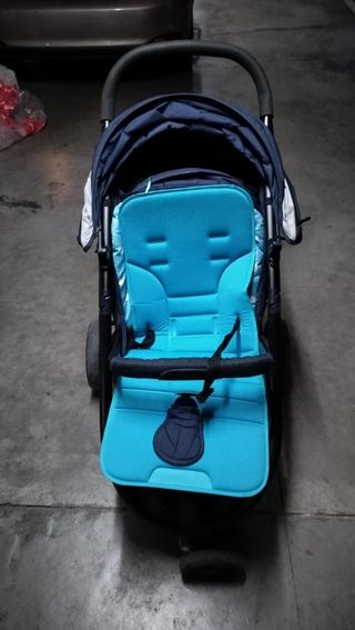 Silla de bebé marca joie con regalo colchón azul.