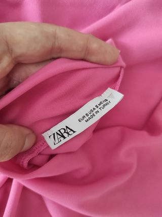 Top Zara tirantes cruzados rosa Talla S.
Nuevo