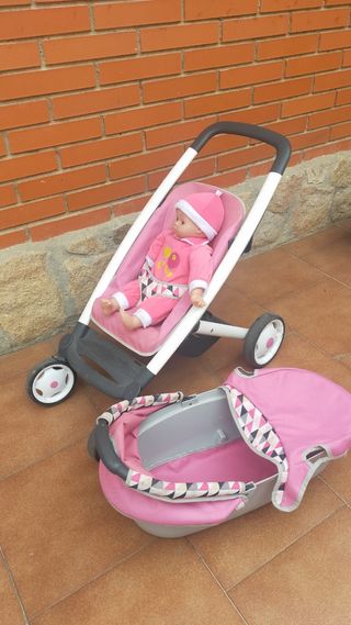 Carro de muñecas rosa