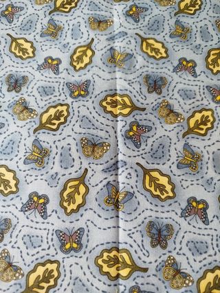 Tela patchwork mariposas y hojas