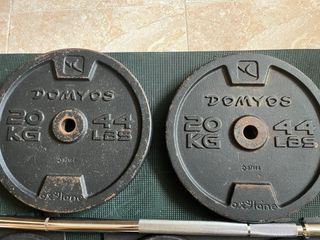 Barra y 50kg en discos Decathlon