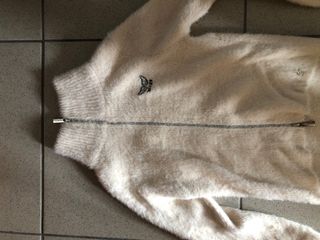 Chaqueta de pelo blanca con cremallera