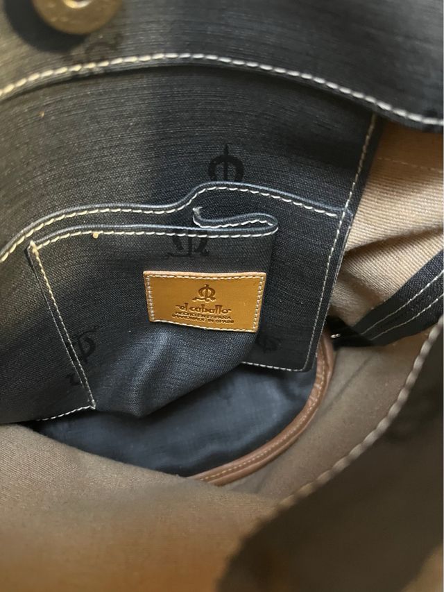 Bolso de mano El Caballo, de piel.