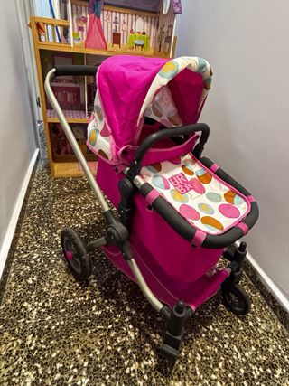 Cochecito de muñecas rosa