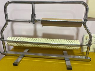 Soporte para rollo de papel de regalo