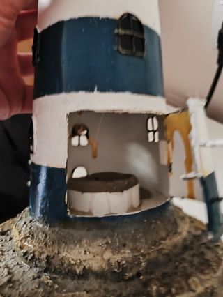 Supporto decorativo per candele a forma di faro