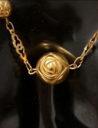 Collana vintage con sfere a rosa