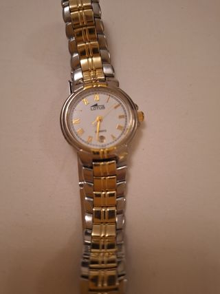 Reloj Lotus Oro y Plata