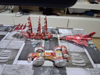 Giocattoli in latta Coca-Cola: aereo, barca e auto