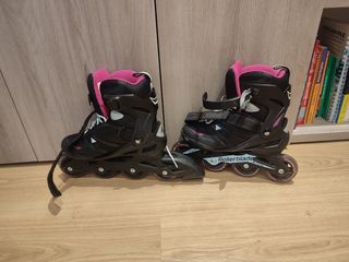 Patines en línea Rollerblade negros y rosas.