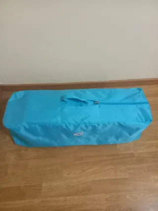 Cuna de viaje azul