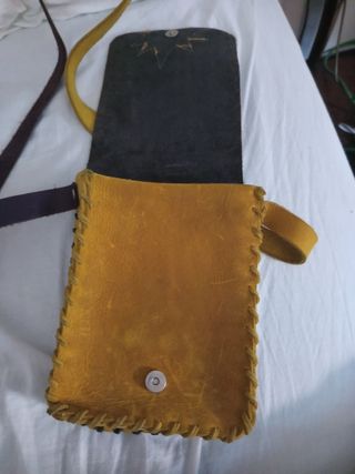 Bolso de piel con diseño de sol