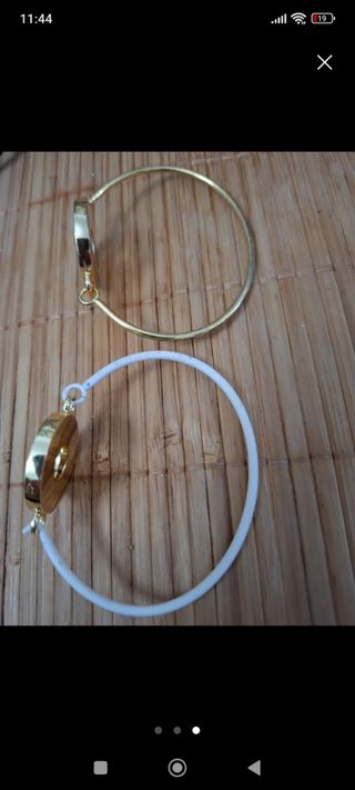 Pulseras Bimba y Lola doradas y negras