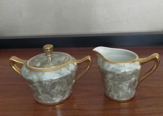 Juego de café de porcelana gris y dorado