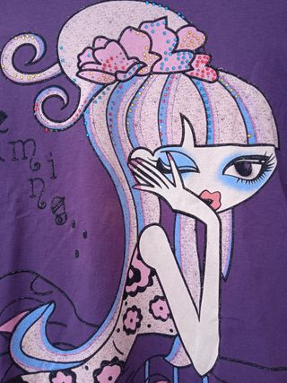Camiseta Morada imagen Muñeca. T: 12 años
