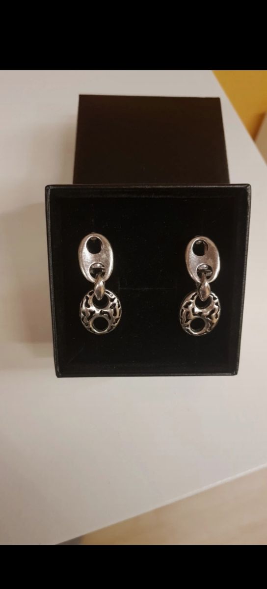 Pendientes calabrote plateados cierre omega